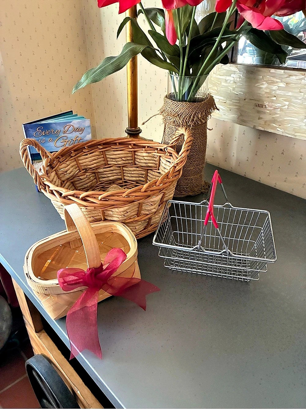 3 Baskets, 1 Round woven 10 inch diameter 5 tall, 1 Metal 6x5 and 1 small 6x4.